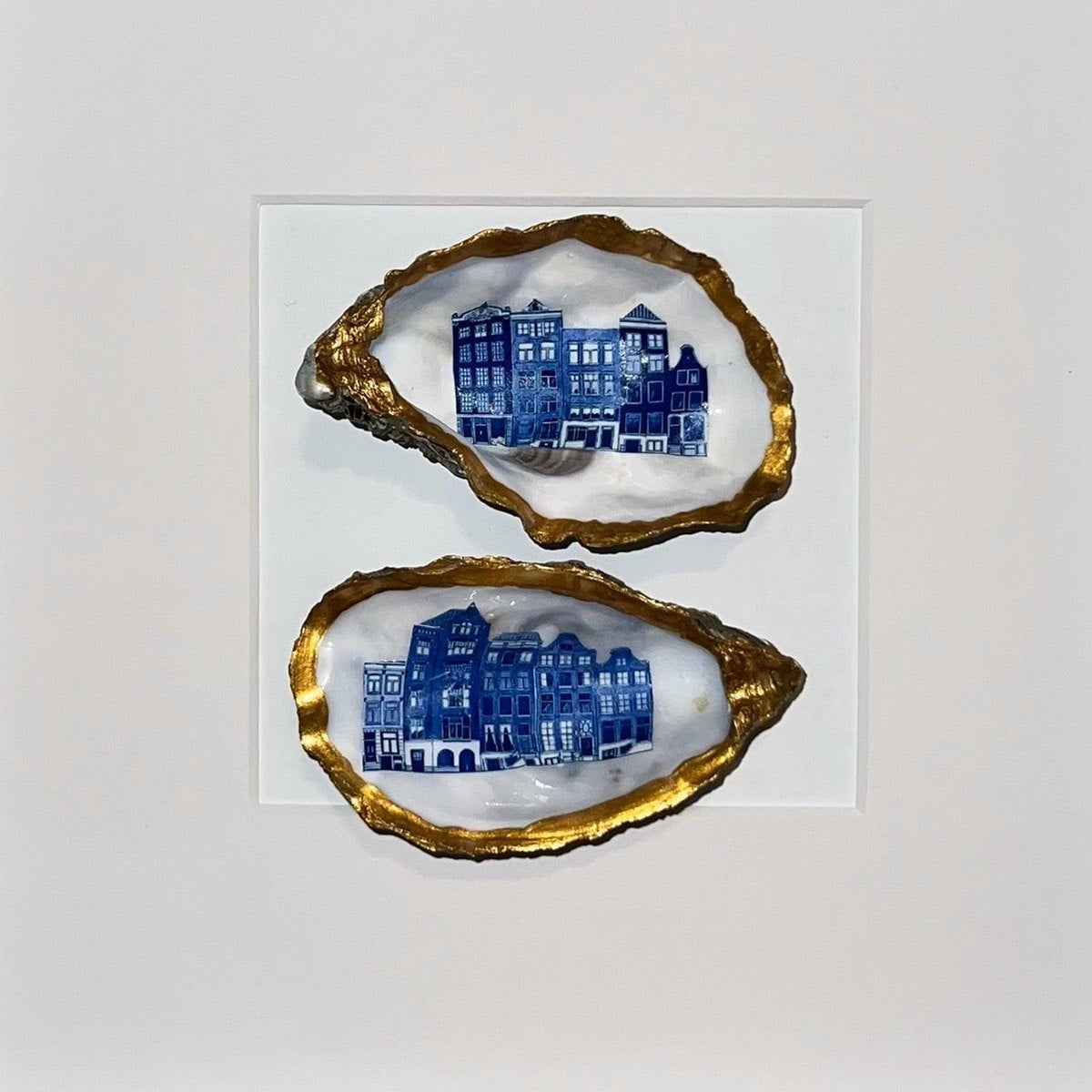 Handgemaakte oesterkunst van KunstLab in lijst