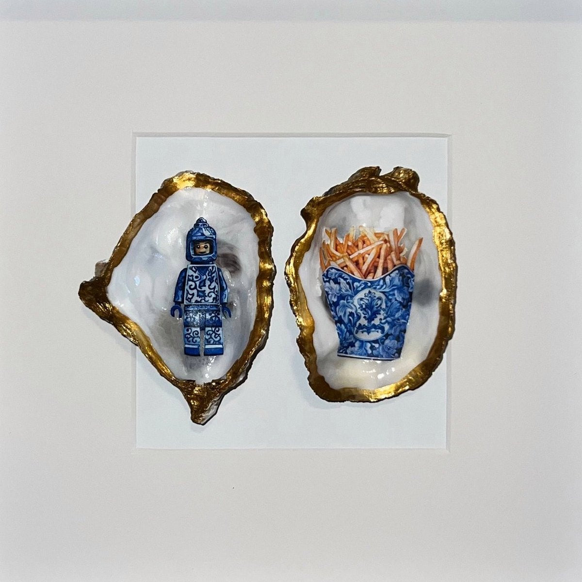 Handgemaakte oesterkunst van KunstLab in lijst